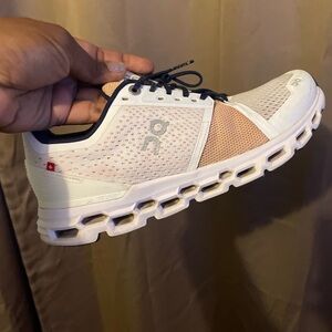 Women’s size 8.5, OnCloud running shoes, lightly worn. Look brand new.